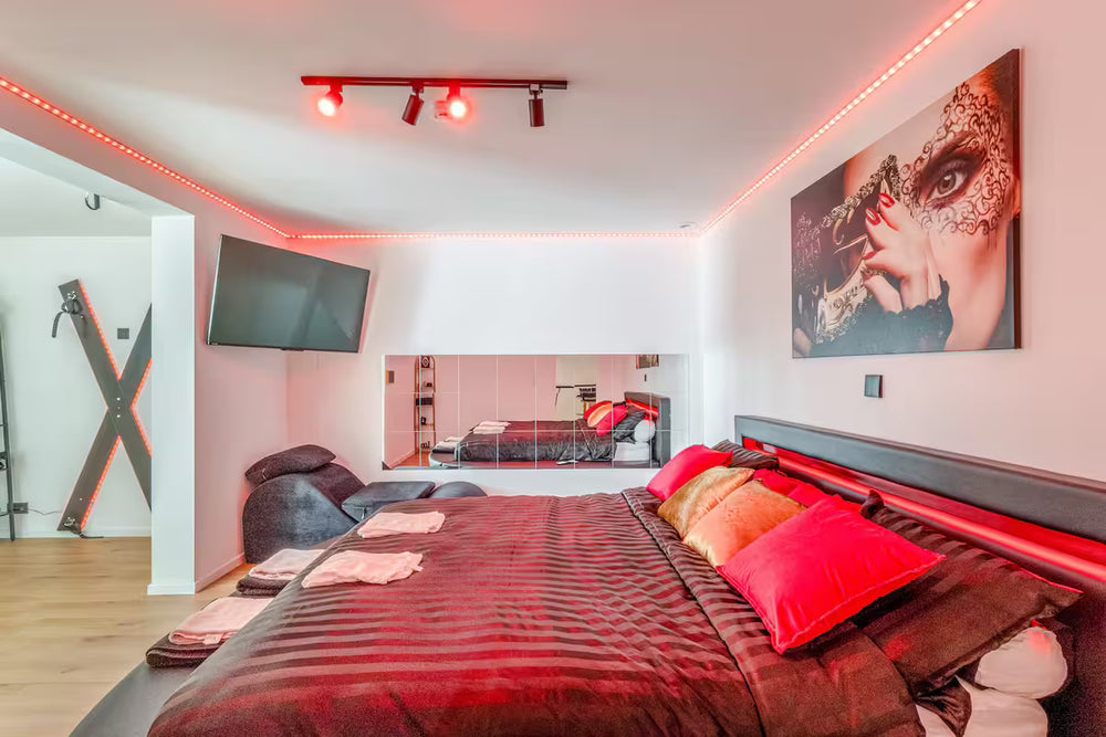 Love Room romantique Les Chambres de Noël, lit double, ambiance intime et chaleureuse pour couple.2 de LoveRoom - Les chambres de Noela
