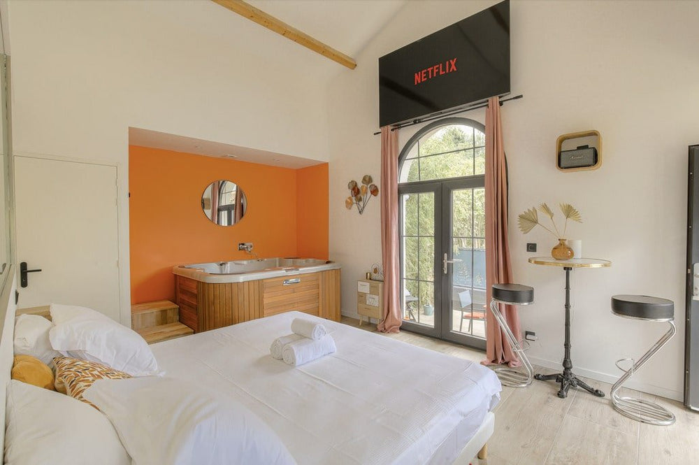 Abricotine - Love’nSpa - weekend en amoureux, love rooms avec spa ou jacuzzi privatif1 de Expérience Abricotine - Jacuzzi-Terrasse

