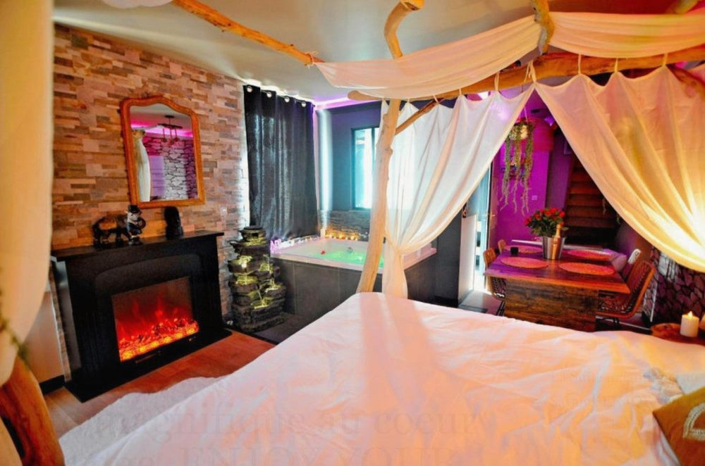 L'Évasion Safari insolite: Spa XXL, Cascade, Cinéma - Love’nSpa - weekend en amoureux, love rooms avec spa ou jacuzzi privatif6 de L'Évasion Safari insolite: Spa XXL, Cascade, Cinéma
