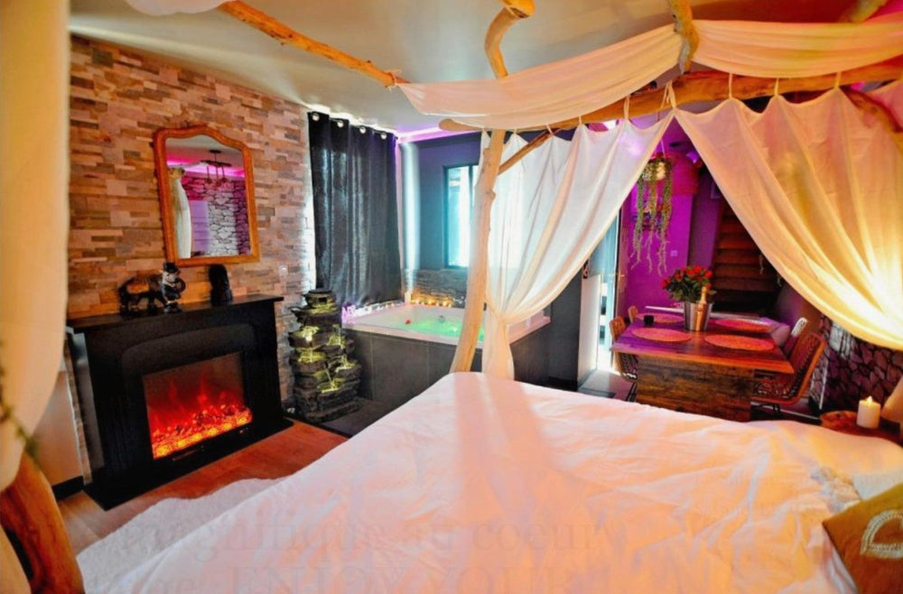 L'Évasion Safari insolite: Spa XXL, Cascade, Cinéma - Love’nSpa - weekend en amoureux, love rooms avec spa ou jacuzzi privatif2 de L'Évasion Safari insolite: Spa XXL, Cascade, Cinéma
