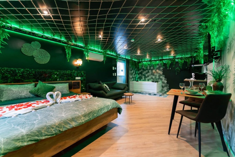 L'oasis tropicale - Love’nSpa - weekend en amoureux, love rooms avec spa ou jacuzzi privatif1 de L'oasis tropicale
