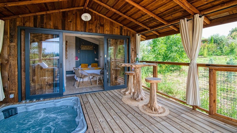 Trésors de Campagne -Lodge sur pilotis « Miel et Coton » avec jacuzzi privatif - Love’nSpa - weekend en amoureux, love rooms avec spa ou jacuzzi privatif2 de Trésors de Campagne -Lodge sur pilotis Miel et Coton avec jacuzzi privatif
